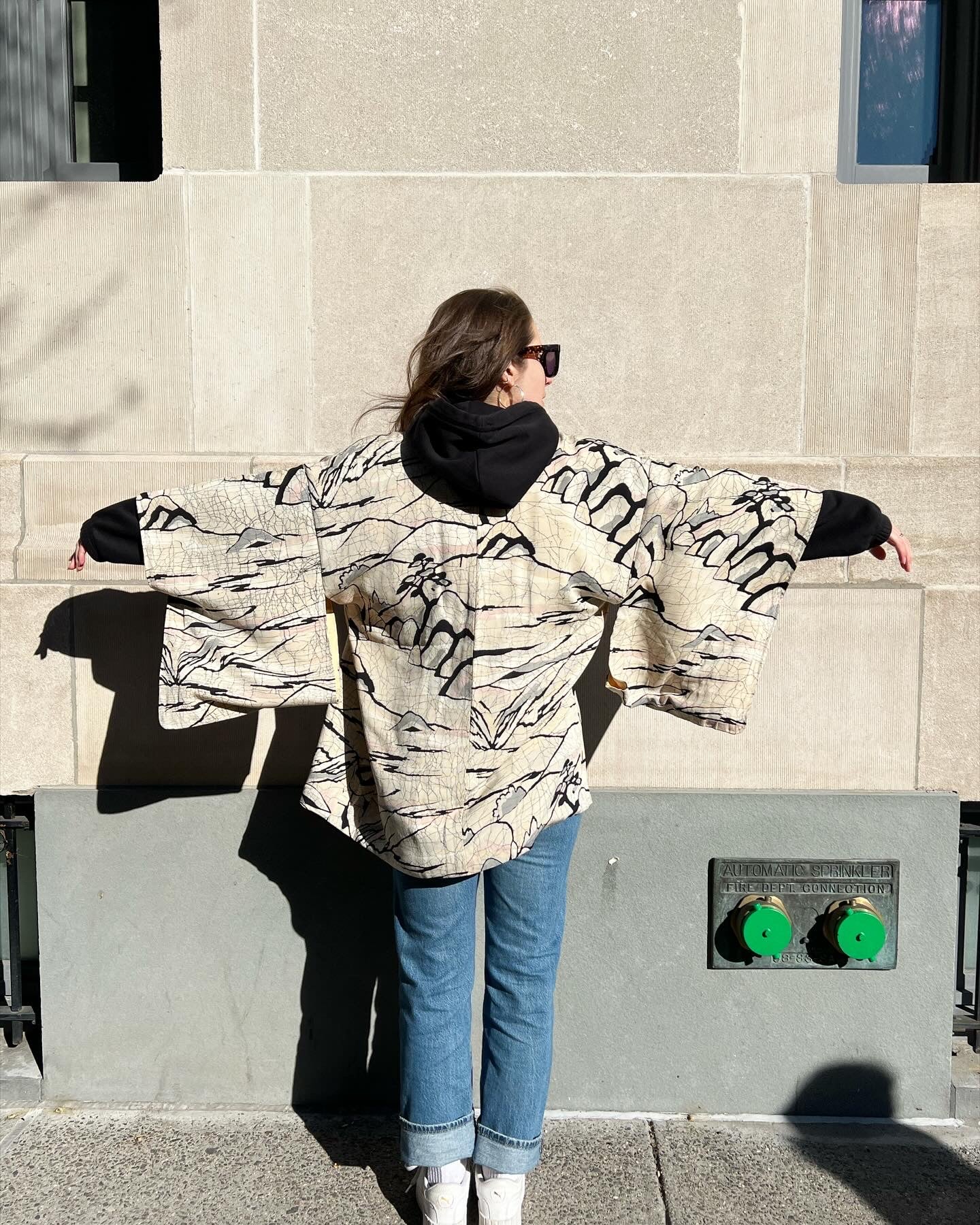 Woman wearing hoari jacket and jeans